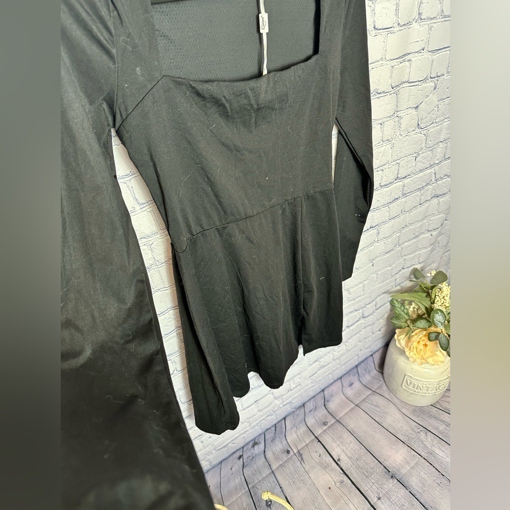 Be the Life of the Party with Quinsen’s Sexy Black Peplum Dress - Picture 3 of 6